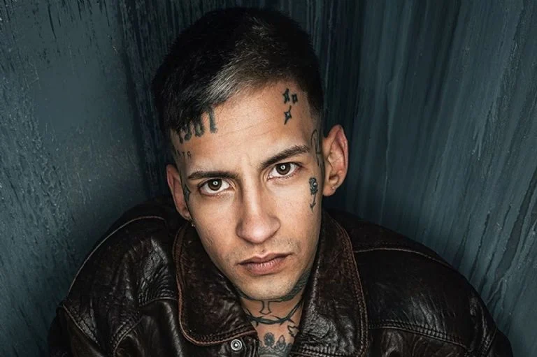 Elian Ángel Valenzuela​, conocido artísticamente como L-Gante.