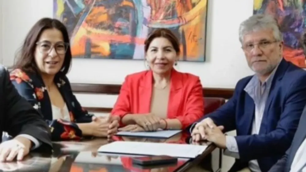 Sandra Mendoza, Carolina Moisés y Guillermo Andrada. 