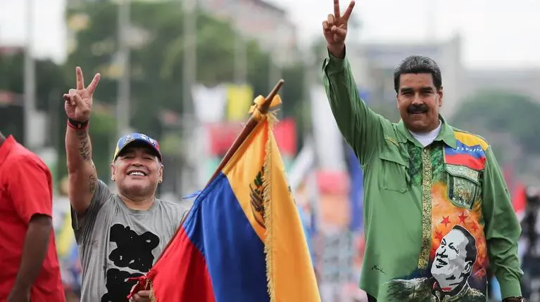 Diego Armando Maradona​ y Nicolás Maduro Moros.