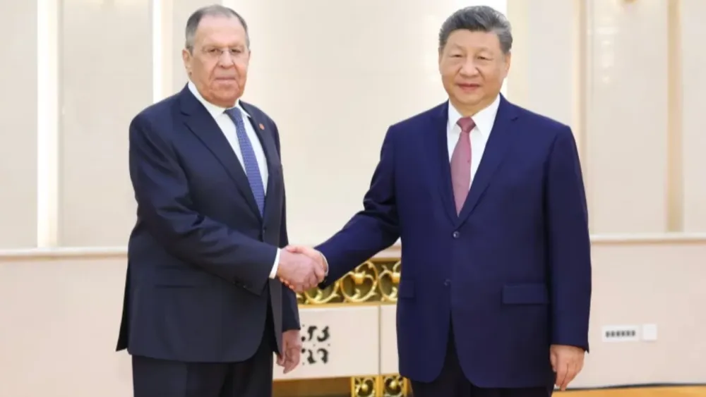Serguéi Víktorovich Lavrov y Xi Jinping.